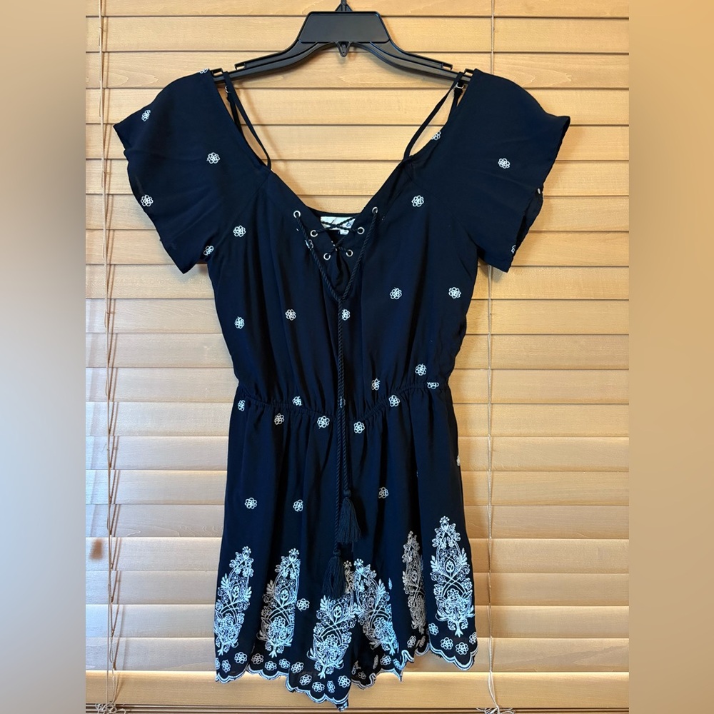 Love Tree NWOT Black Short Sleeve Tie Front with tassels Jumpsuit. Size medium